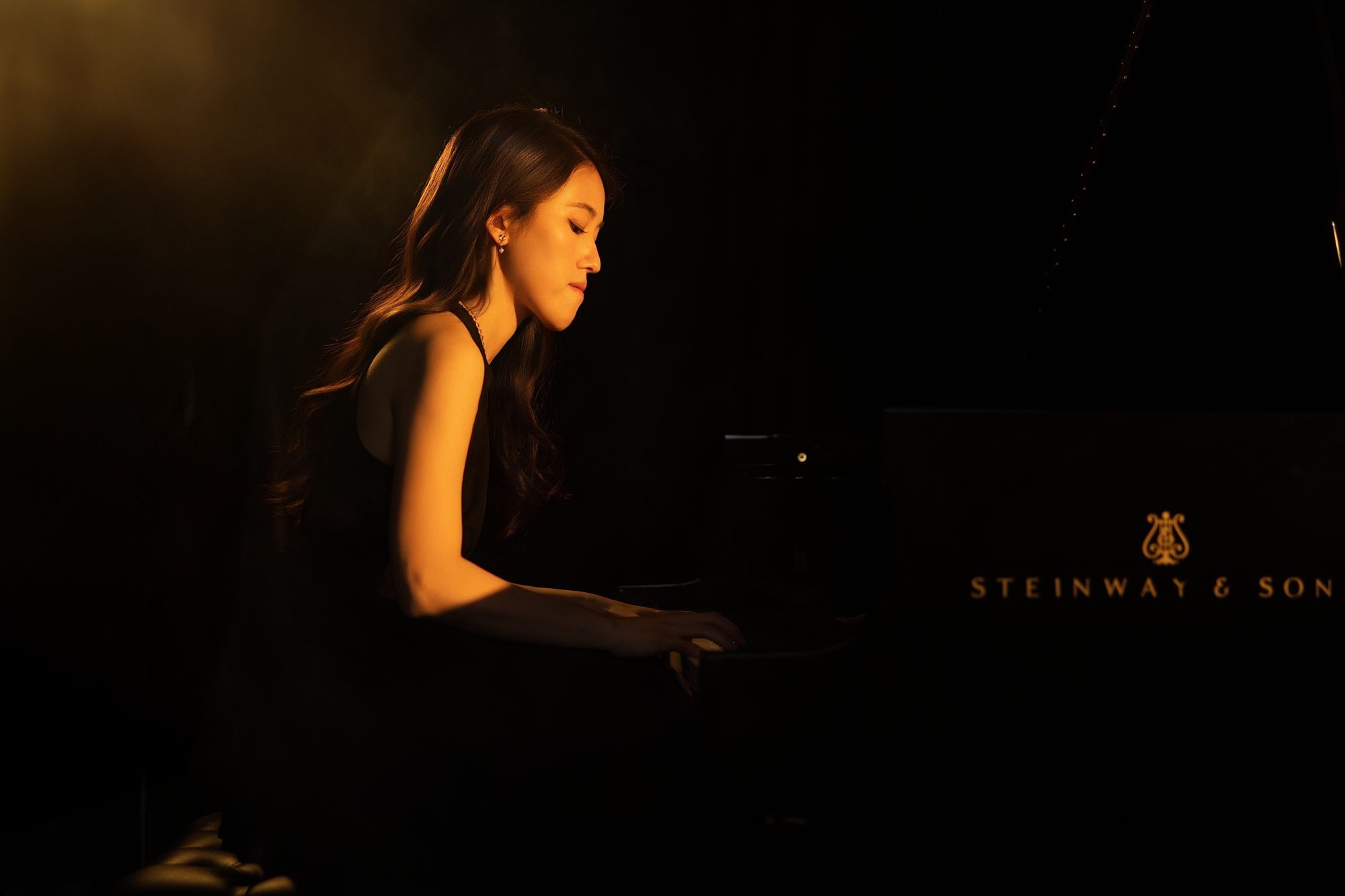 Yiwei Huang